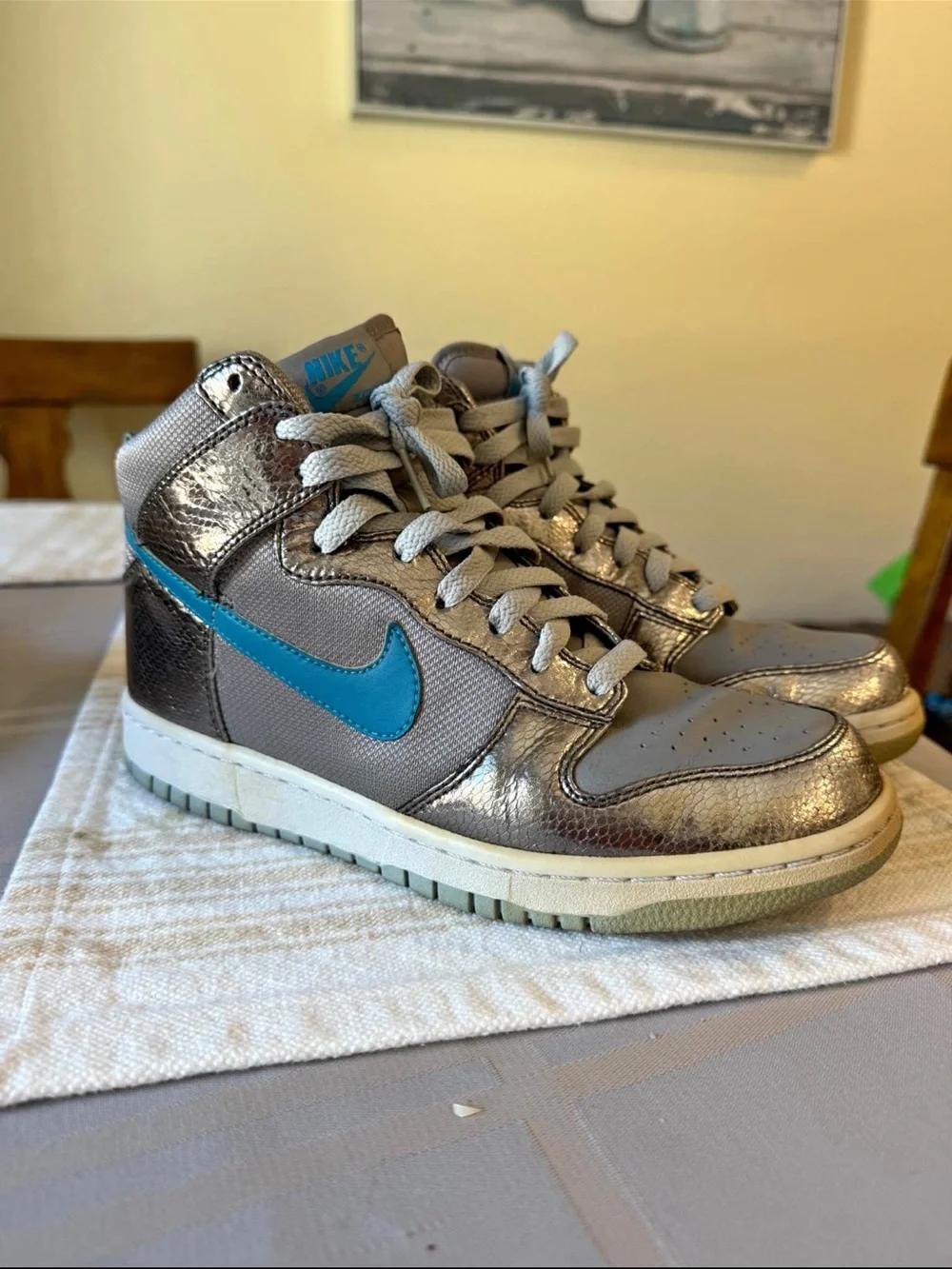 Nike Metallic Gray High-Top Sneakers with Blue Swoosh